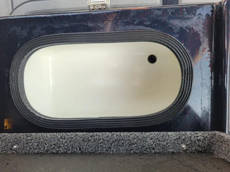Slide: The Image of Bass Cat Jaguar 2025 boat hatch with oval design. - 19