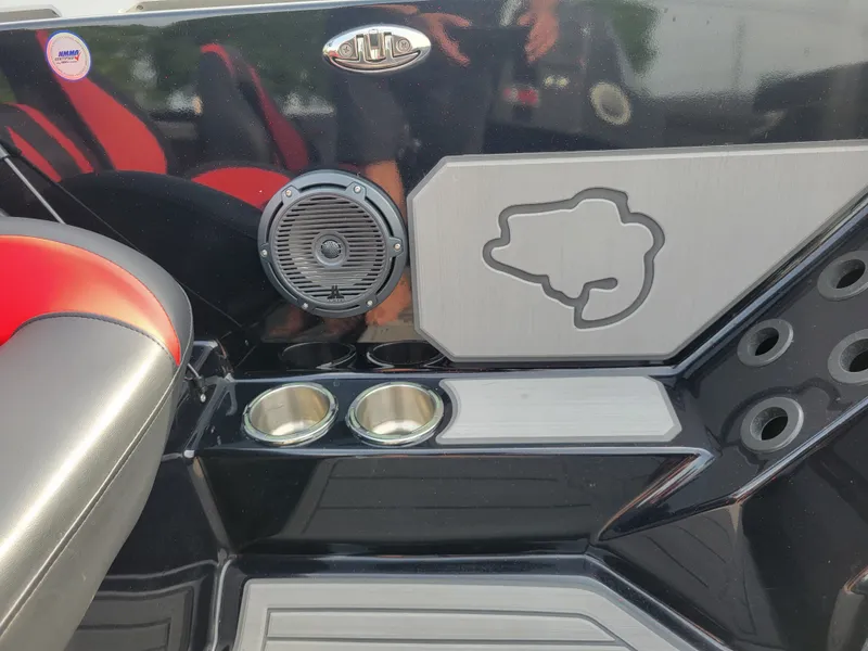 Slide: The Image of Interior of 2025 Bass Cat Jaguar with speaker and cup holders. - 27