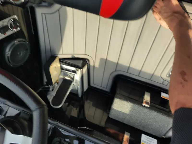 Slide: The Image of Interior of a 2025 Bass Cat Jaguar boat with pedal control. - 29