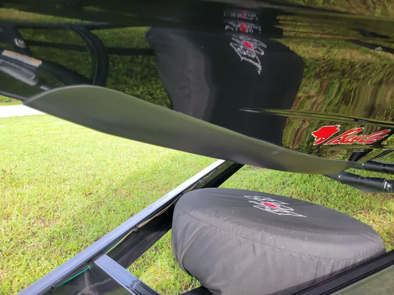 Slide: The Image of Close-up of a 2025 Bass Cat Jaguar boat with logo. - 38