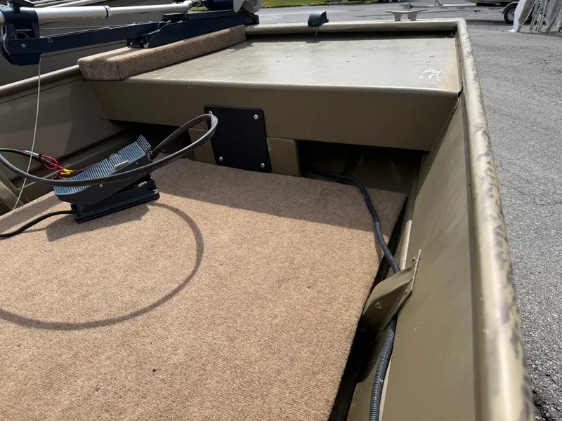 Slide: The Image of Interior view of a 2016 G3 1544 Jon boat with carpeted floor. - 8