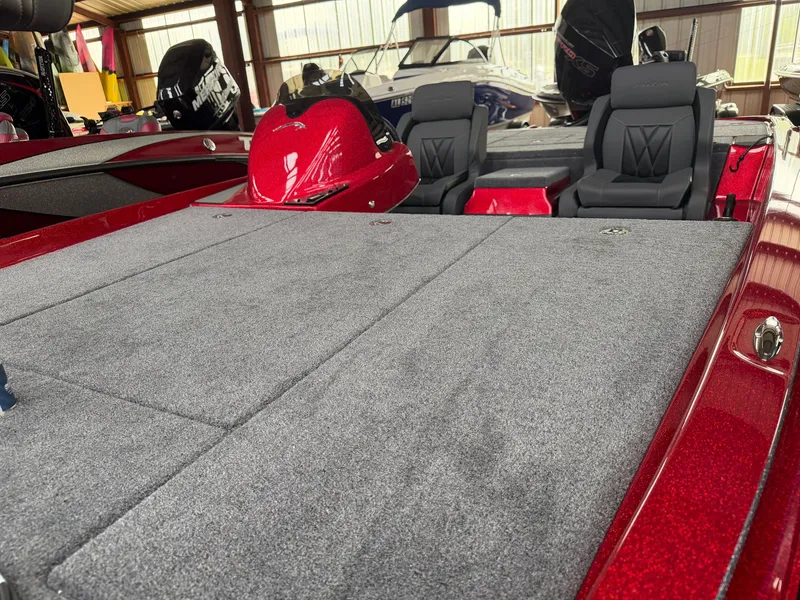 Slide: The Image of Falcon F195 boat 2026 with gray carpet and red accents. - 11