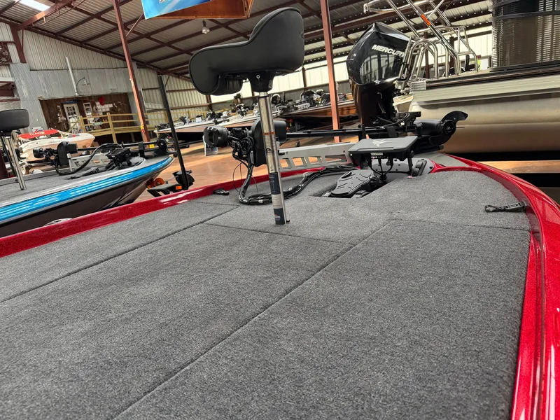 Slide: The Image of Falcon F195 boat 2026 in showroom with gray carpeted deck. - 5