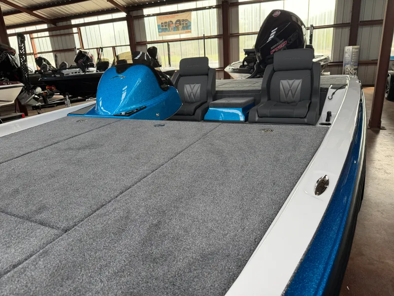 Slide: The Image of Falcon F195 boat 2026 with gray carpet and blue accents. - 11
