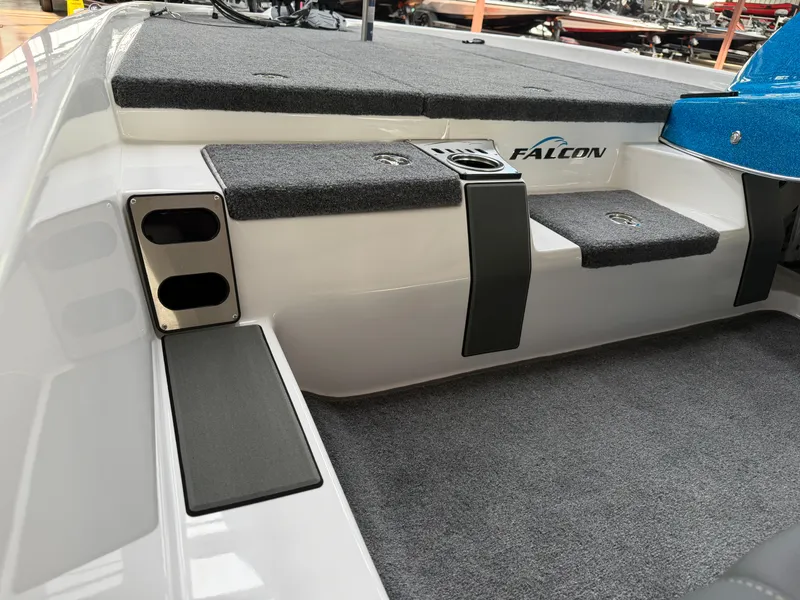 Slide: The Image of Falcon F195 boat 2026 with gray carpet and steps. - 13