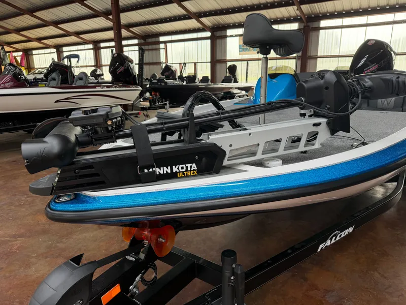 Slide: The Image of Falcon F195 boat 2026 with Minn Kota Ultrex motor in warehouse. - 9