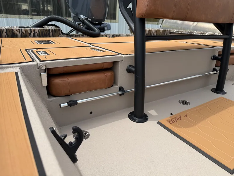 Slide: The Image of Interior of Avid 20CC Rogue 2026 with seating and storage. - 18