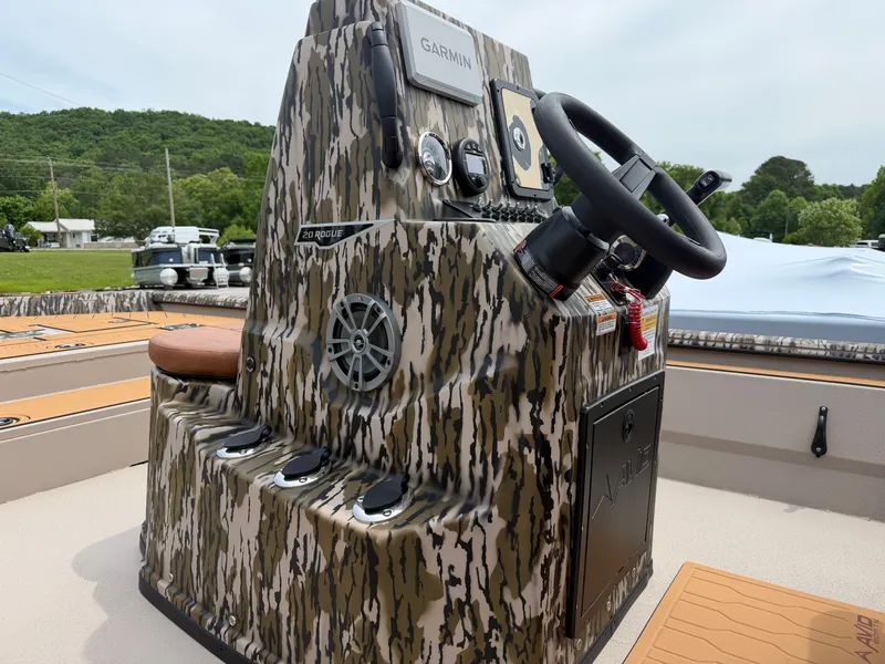 Slide: The Image of Avid 20CC Rogue 2026 boat console with Garmin controls. - 9