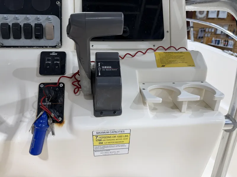 Slide: The Image of Control console of a 2005 Key West 225 boat. - 18