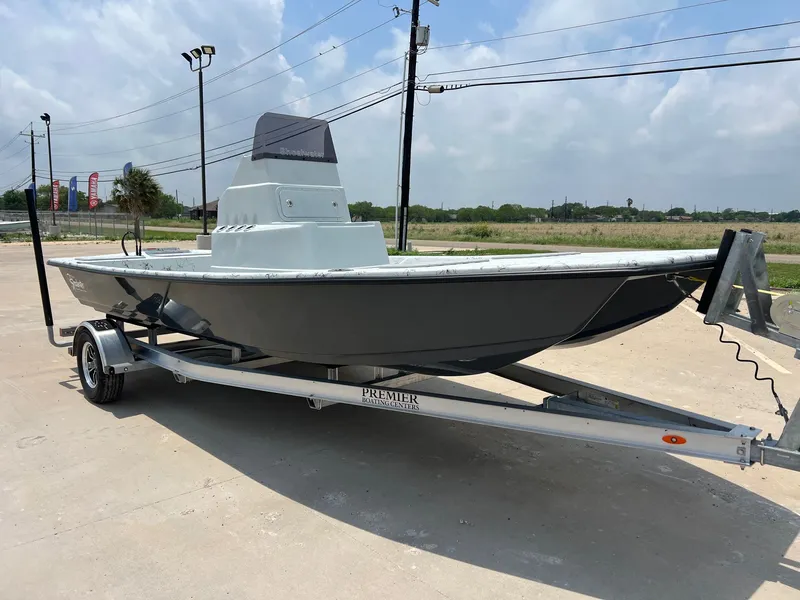 Slide: The Image of 2026 Shoalwater 20' Catamaran on trailer outdoors. - 7