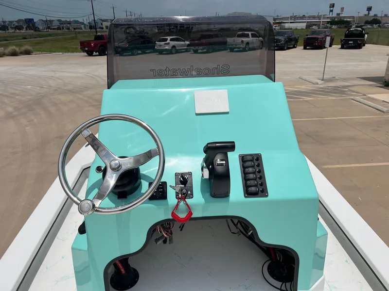 Slide: The Image of Helm of a 2026 Shoalwater 23' Catamaran. - 17