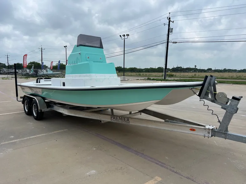 Slide: The Image of 2026 Shoalwater 23' Catamaran on trailer outdoors. - 7