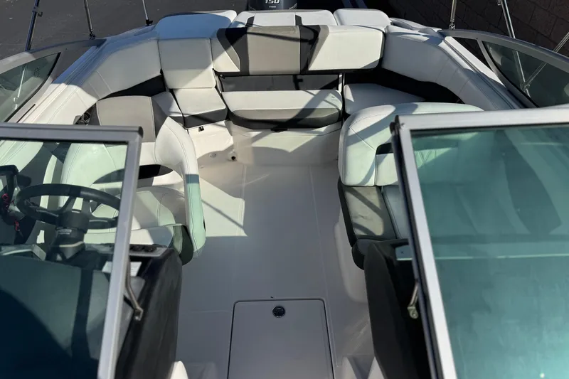 Slide: The Image of 2019 Regal 21 OBX boat interior with white and black seating arrangement. - 14