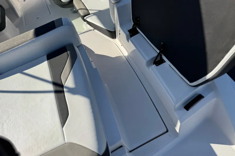 Slide: The Image of Interior seating of a 2019 Regal 21 OBX boat, featuring sleek design and comfortable upholstery. - 9