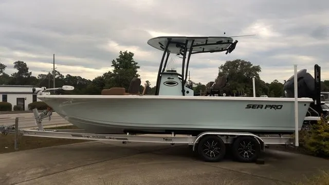 The Image of 2026 Sea Pro 250 Bay boat on trailer, side view. - 1