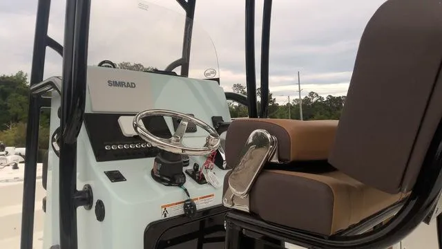 Slide: The Image of Interior view of 2026 Sea Pro 250 Bay with steering console. - 3