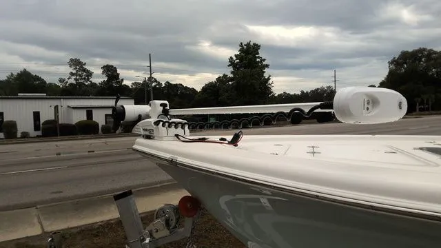 Slide: The Image of 2026 Sea Pro 250 Bay boat with trolling motor on trailer. - 8