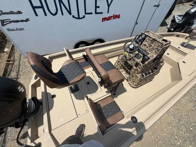 Slide: The Image of Interior view of Excel Bay Pro 220 Elite boat, model year 2026. - 4