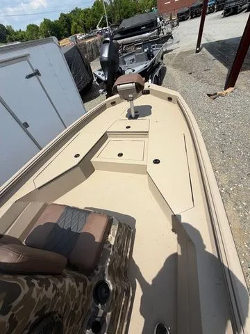 Slide: The Image of Excel Bay Pro 220 Elite boat, 2026 model with 200 HP Suzuki engine. - 9