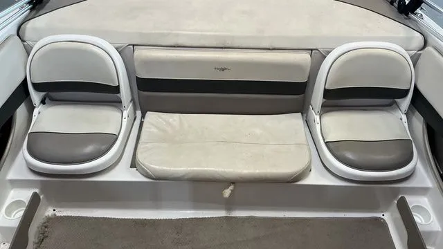 Slide: The Image of Interior of a 2002 Four Winns 180 Horizon boat with seating. - 13