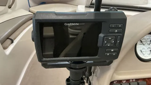 Slide: The Image of Garmin GPS on a 2002 Four Winns 180 Horizon boat. - 18