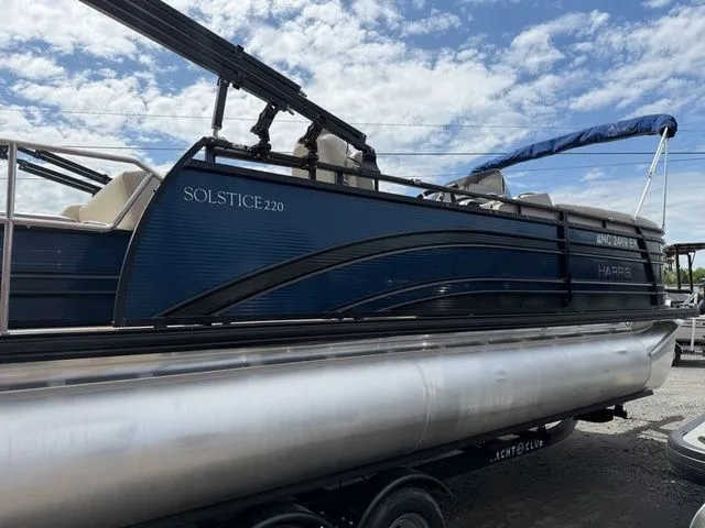 Slide: The Image of 2019 Harris Solstice 220 Tritoon with 150 HP, side view. - 10