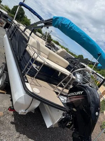 Slide: The Image of 2019 Harris 220 Solstice Tritoon with Mercury engine, on trailer. - 3