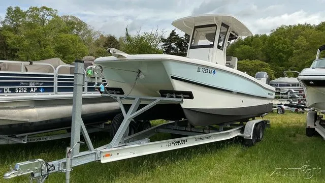 The Image of 2022 World Cat 235 CC boat parked on trailer outdoors. - 1