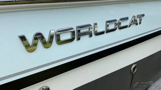 Slide: The Image of Close-up of World Cat 235 CC boat logo, 2022 model. - 6
