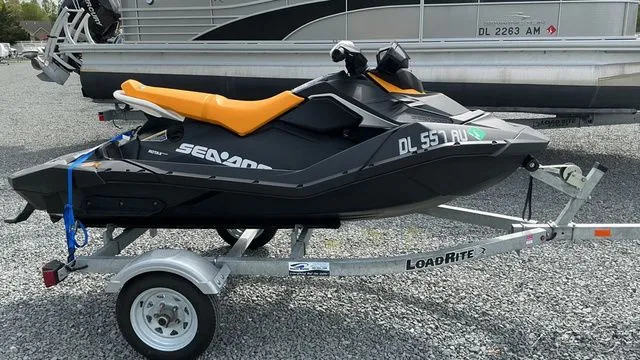 Slide: The Image of 2021 Sea-Doo SPARK 3I jet ski on trailer, side view. - 4
