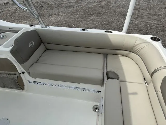 Slide: The Image of Interior of Key West 239 DFS boat, 2023 model, featuring beige upholstery. - 10