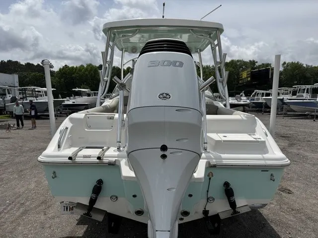 Slide: The Image of Rear view of a 2023 Key West 239 DFS boat outdoors. - 3