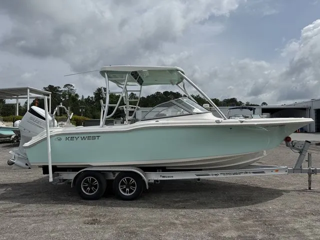 Slide: The Image of 2023 Key West 239 DFS boat on trailer, side view. - 5