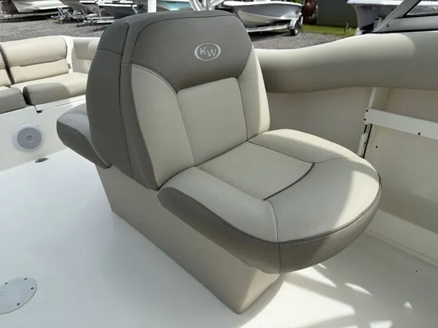 Slide: The Image of 2023 Key West 239 DFS boat seat in gray and beige leather. - 9
