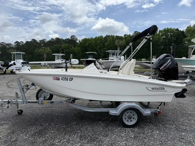 The Image of 2023 Boston Whaler 130 Super Sport on trailer, side view. - 1