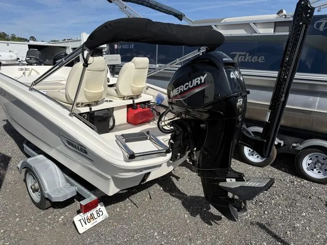 Slide: The Image of 2023 Boston Whaler 130 Super Sport with Mercury 40 HP engine. - 11