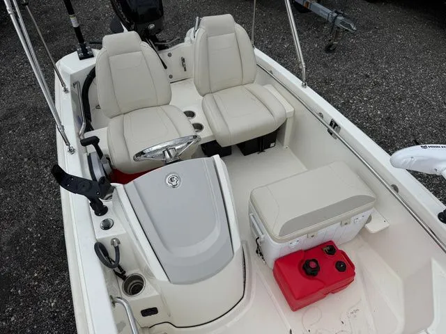 Slide: The Image of Interior of 2023 Boston Whaler 130 Super Sport with seating and storage. - 6
