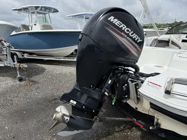Slide: The Image of 2018 Tahoe 550 TS boat with Mercury outboard motor. - 15