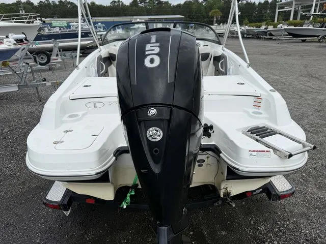 Slide: The Image of Rear view of a 2018 Tahoe 550 TS boat with outboard motor. - 4