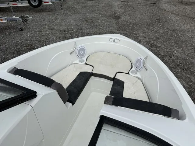 Slide: The Image of Interior view of a 2018 Tahoe 550 TS boat with seating area. - 6