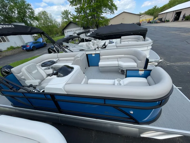 The Image of 2026 Godfrey EX 1880CX CRUISE pontoon boat on parking lot. - 1