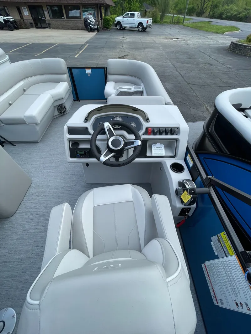 Slide: The Image of Interior view of 2026 Godfrey EX 1880CX CRUISE boat with helm console. - 14