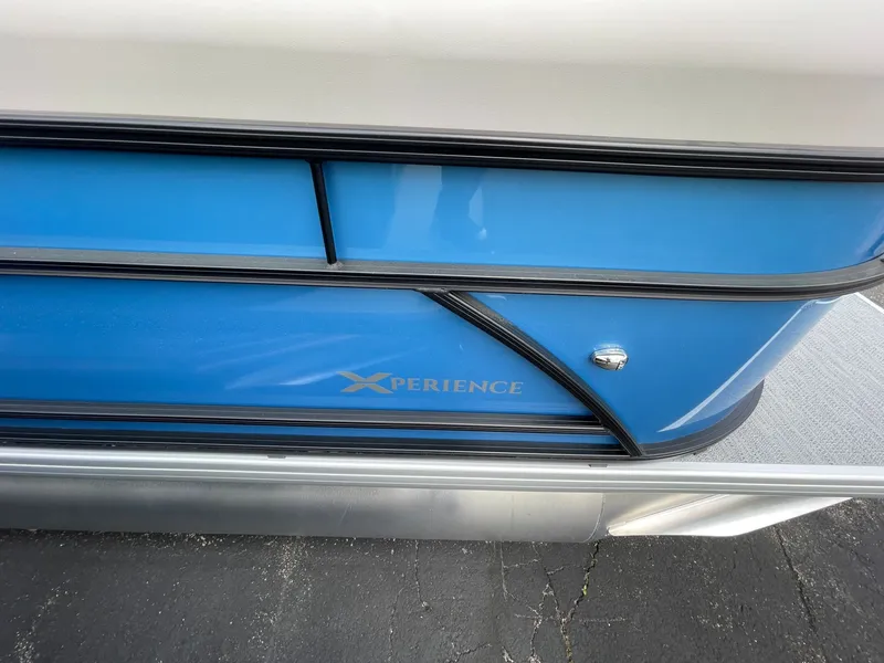 Slide: The Image of Godfrey EX 1880CX CRUISE 2026, blue boat with Xperience logo. - 3