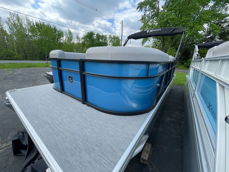 Slide: The Image of 2026 Godfrey EX 1880CX CRUISE pontoon boat parked outdoors. - 5