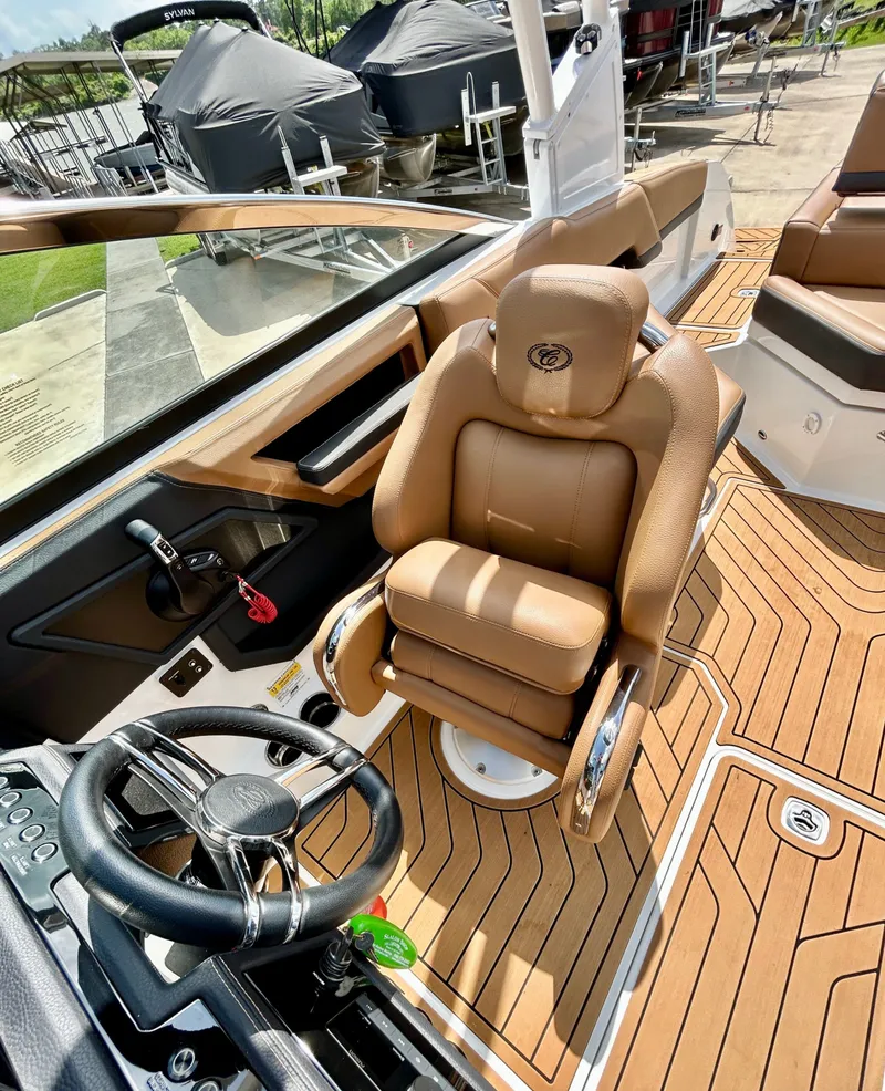 Slide: The Image of Interior of a 2022 Cobalt R4 Outboard with luxurious leather seating. - 23