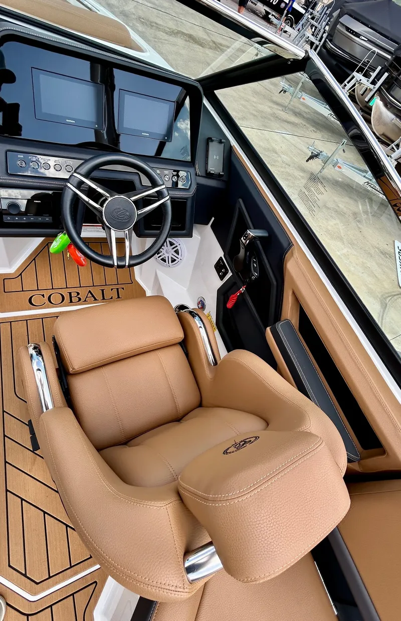 Slide: The Image of Interior of 2022 Cobalt R4 Outboard with leather seats and modern cockpit. - 26