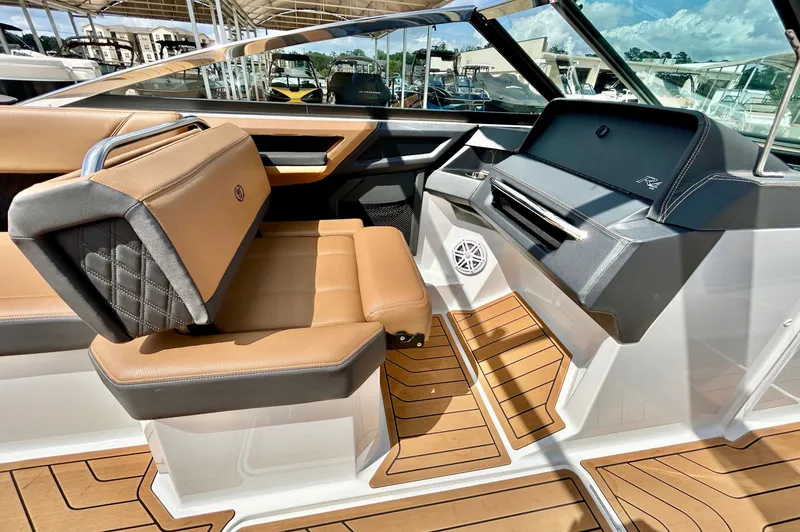 Slide: The Image of Interior of 2022 Cobalt R4 Outboard with luxurious seating. - 32