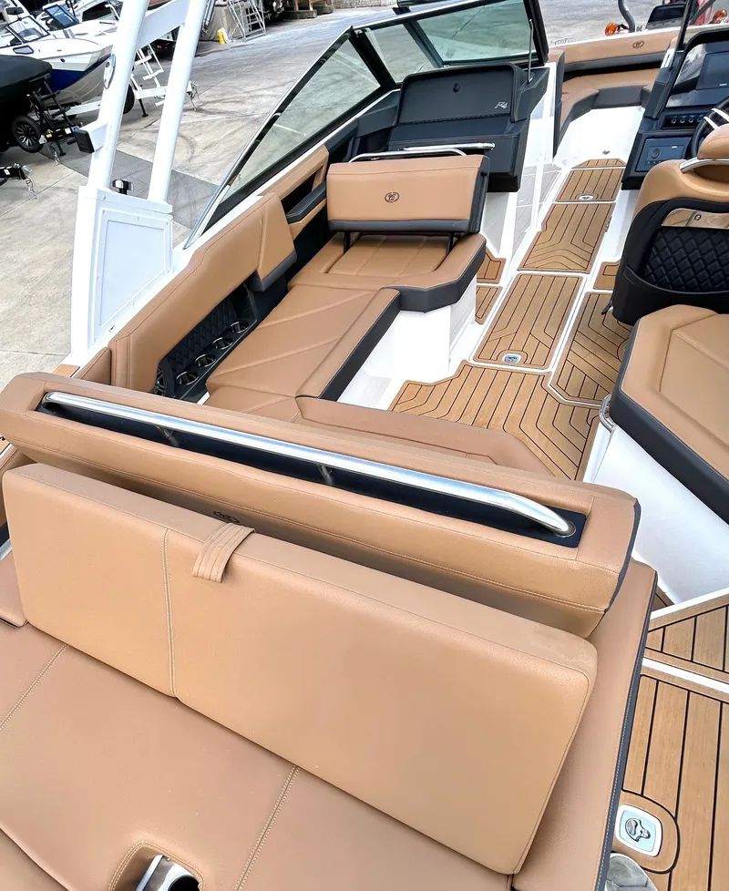 Slide: The Image of Interior of a 2022 Cobalt R4 Outboard with luxurious leather seating. - 33