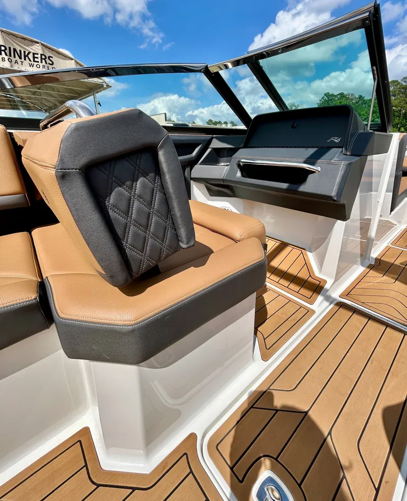 Slide: The Image of Interior of a 2022 Cobalt R4 Outboard boat with luxurious seating. - 35