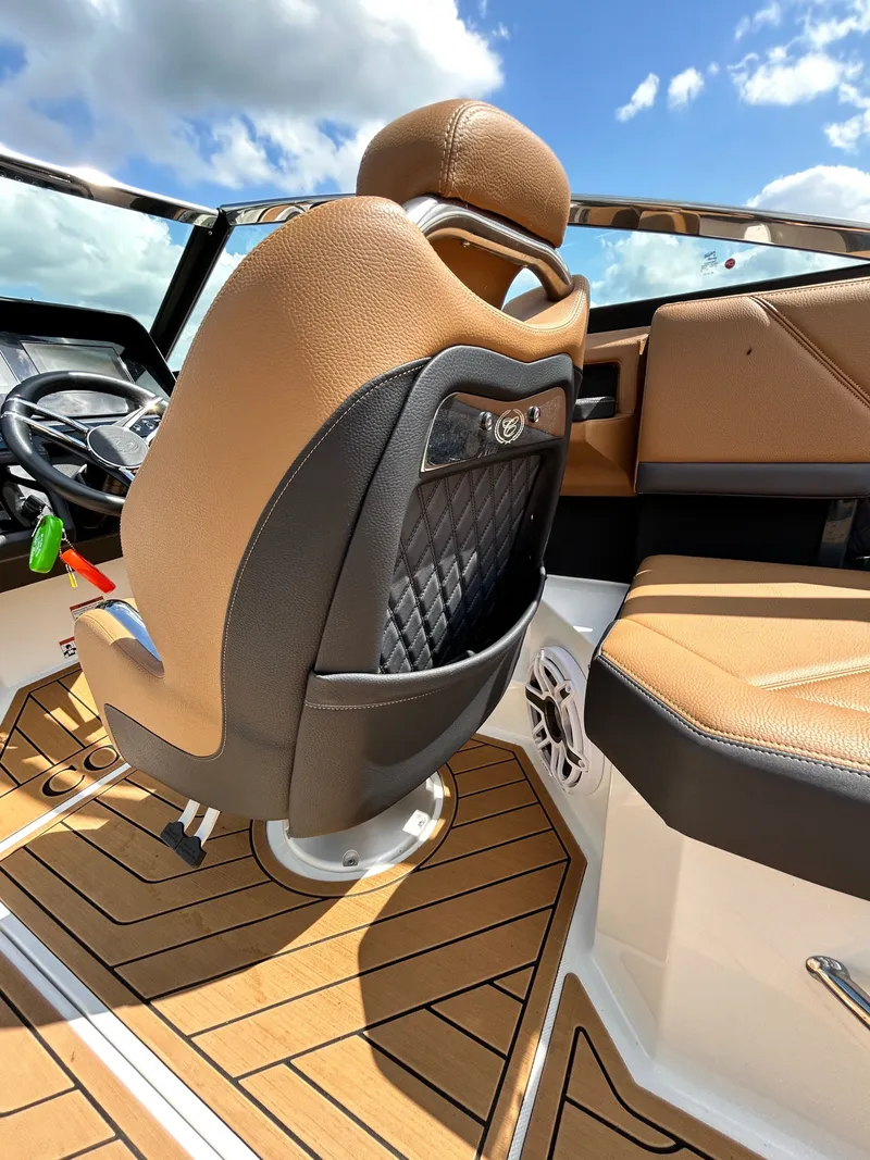 Slide: The Image of Interior of 2022 Cobalt R4 Outboard with luxurious leather seating. - 43